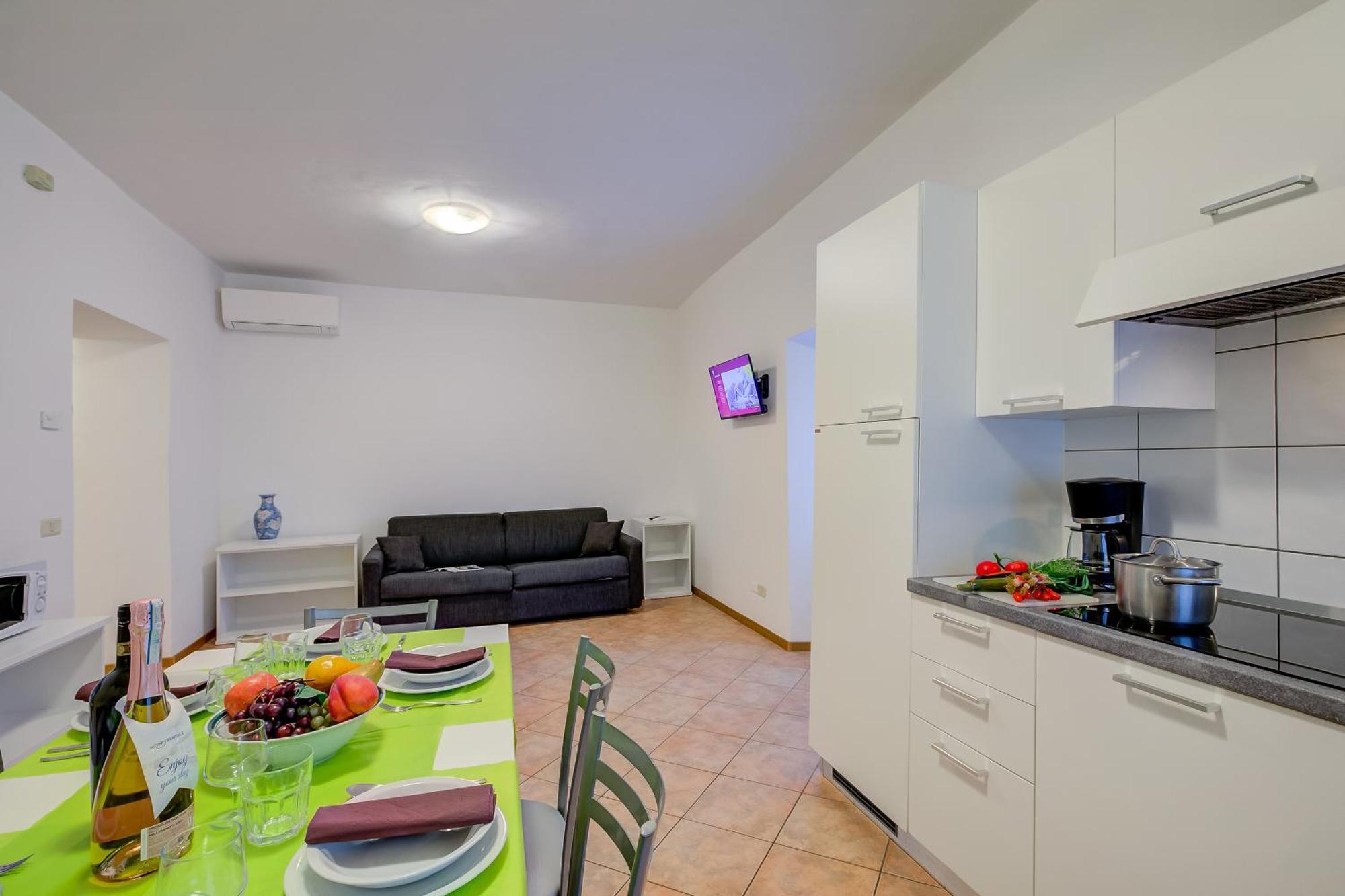 Casa Alpino Aparthotel ริวาเดลการ์ดา ภายนอก รูปภาพ